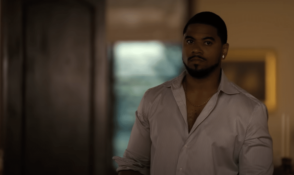 Roy with a concerned look on his face in midst confrontation with his father.