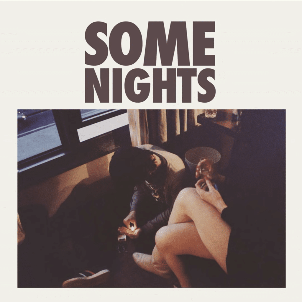 "Some Nights" album cover features a man and woman in a motel room, the man lighting a match. Neither face is visible.
