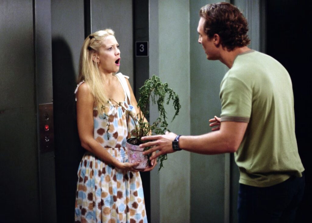 How to Lose a Guy in 10 Days, starring Kate Hudson, Matthew McConaughey, and Kathryn Hahn - Kate Hudson holding a love fern