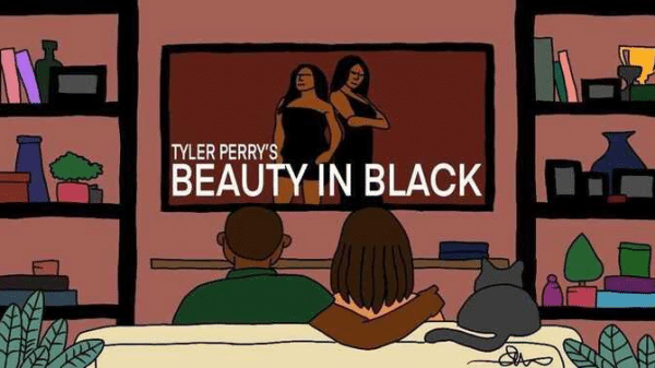 A couple is on the couch watching their TV where Tyler Perry's Beauty in Black is playing