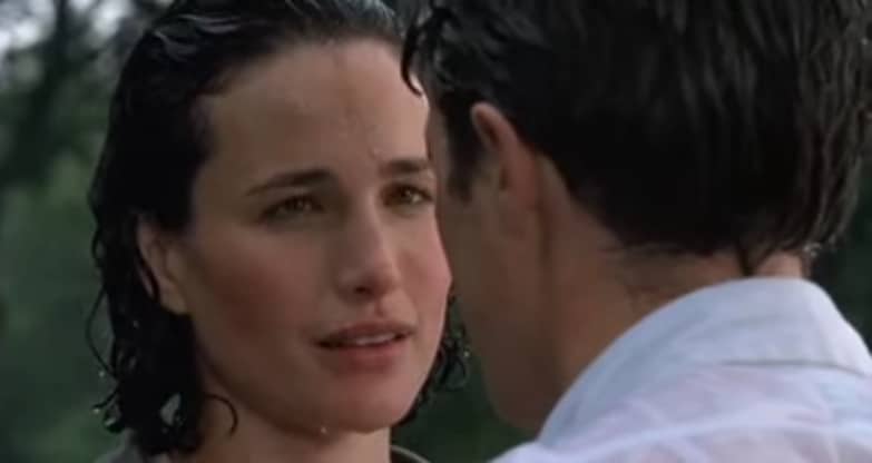 Woman stares at the man she loves in the rain