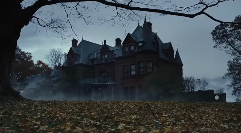 Gloomy shot of a giant, gothic mansion