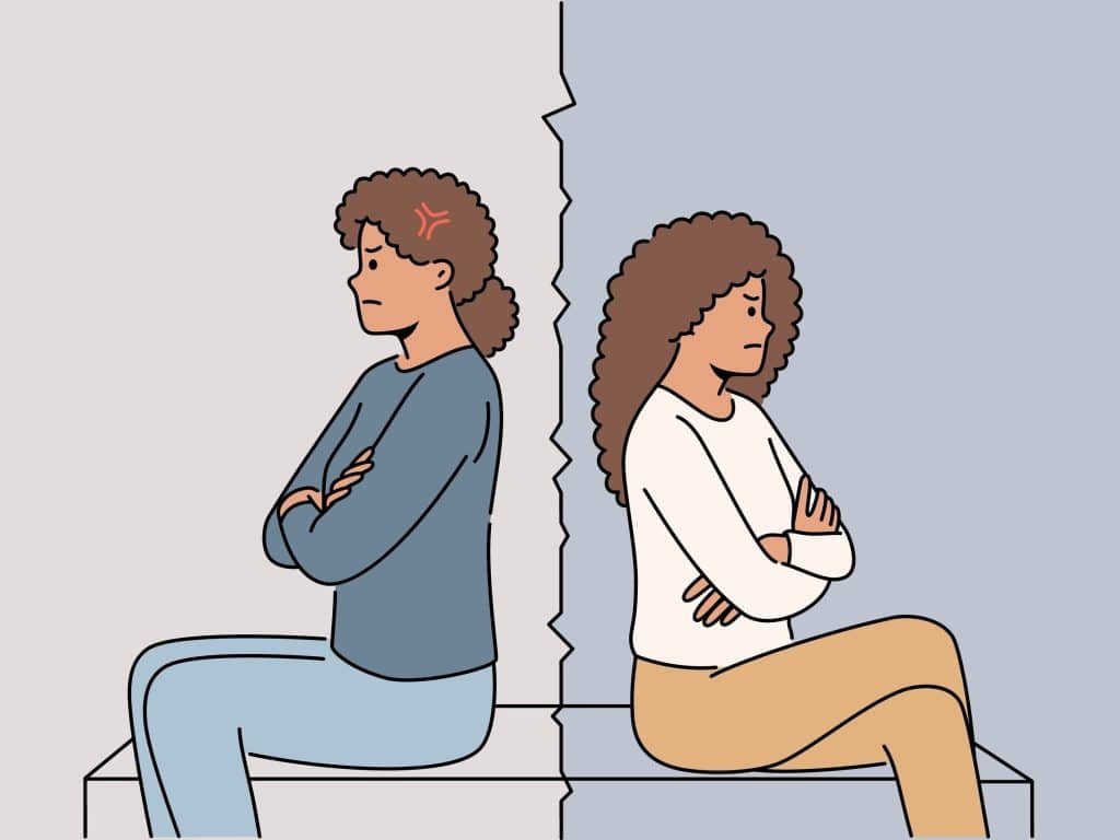 Mother and teenage daughter fighting, back-to-back, refusing to look at each other. A common phase in growing up.