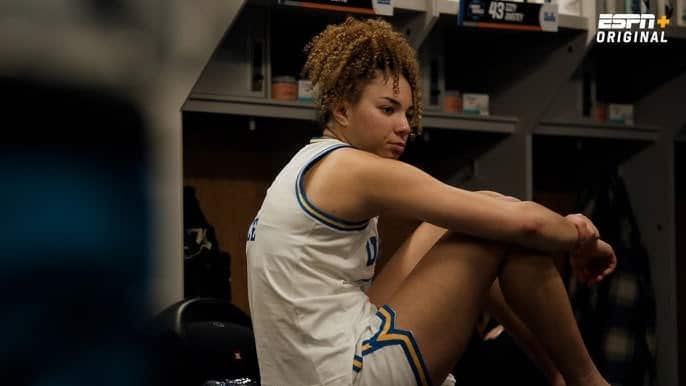 Kiki Rice sits in the UCLA locker room.