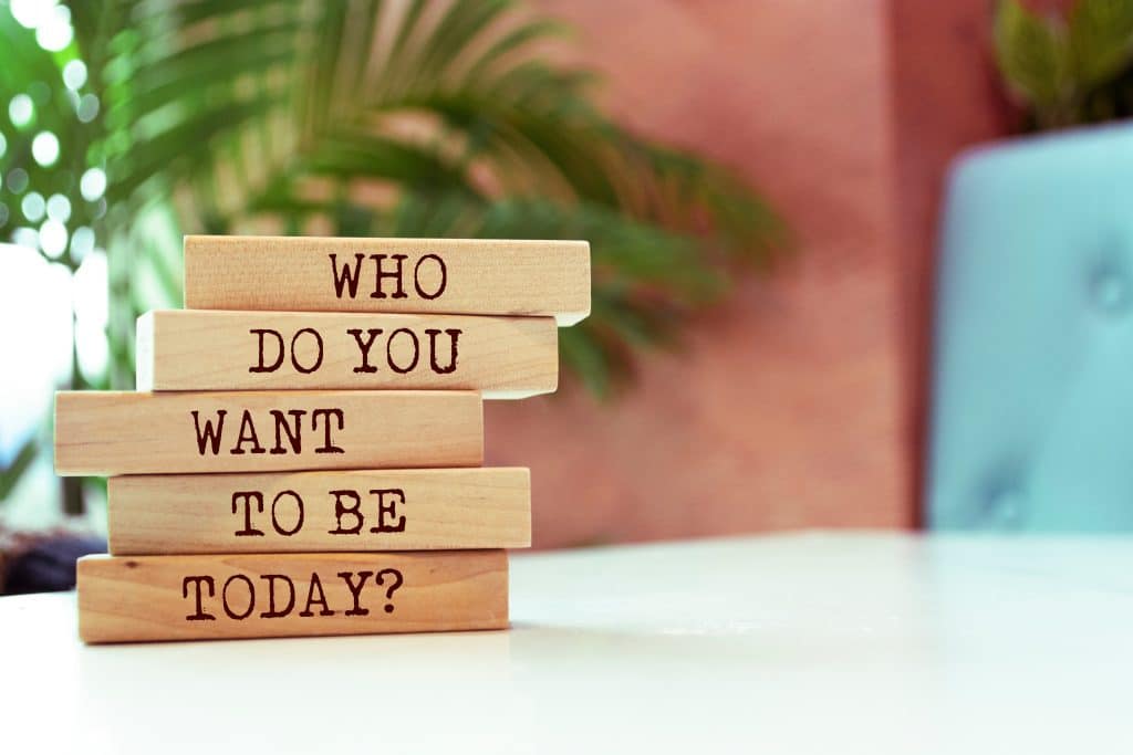 Block stacked with "who do you want to be today" written on them