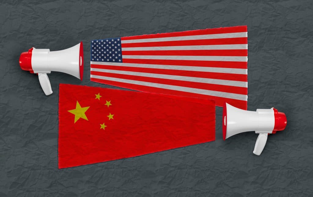 A megaphone with a graphic of the U.S. flag and a megaphone with a graphic of the Chinese flag
