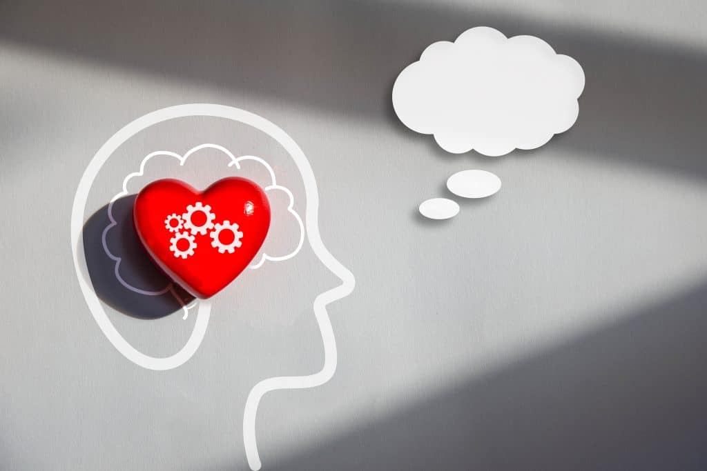 Outline of head with heart inside where brain should be