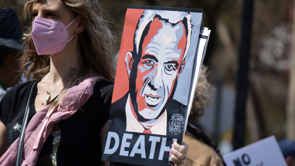 March 29, 2025: Anti-RFK Jr. sign at a protest march against Elon Musk and DOGE in Manhattan. Image: Shutterstock/Christopher Penler
