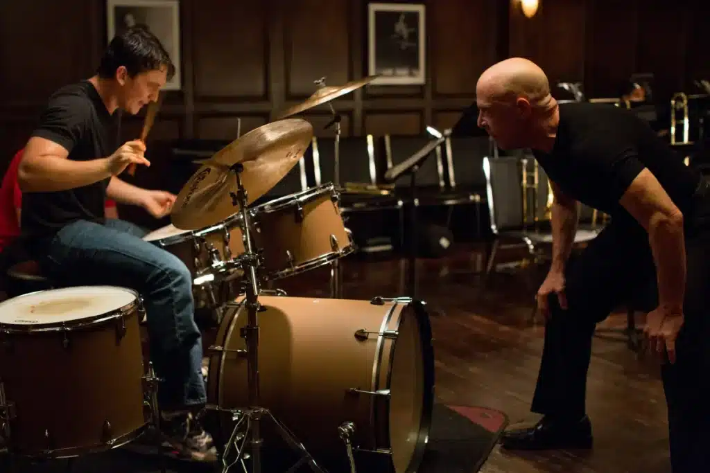 Whiplash features a bloodied Miles Teller and abusive J. K. Simmons in this must-watch for music majors
