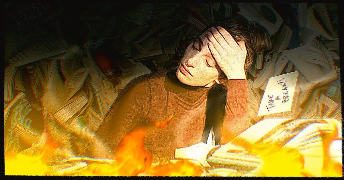A woman at her desk is surrounded by the tasks she needs to do.