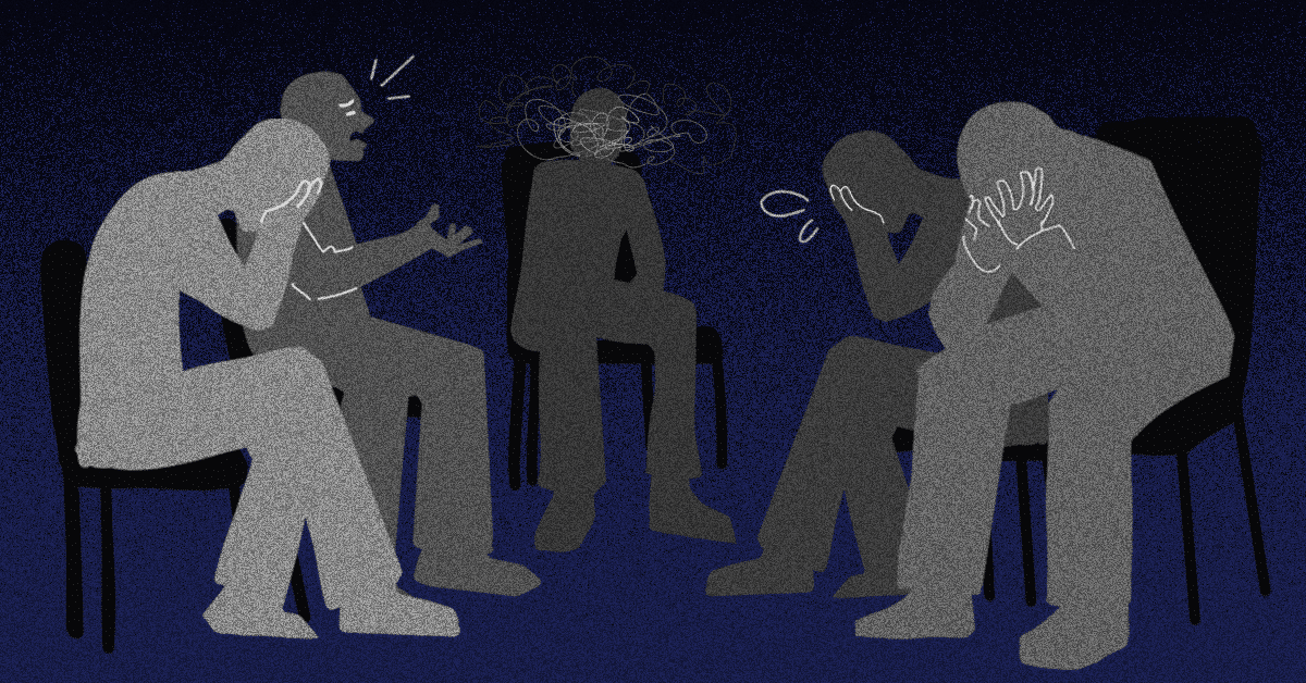 Five people sitting around in a circle. Four of them are visibly reacting with grief. While the center one has negative spirals over their face.
