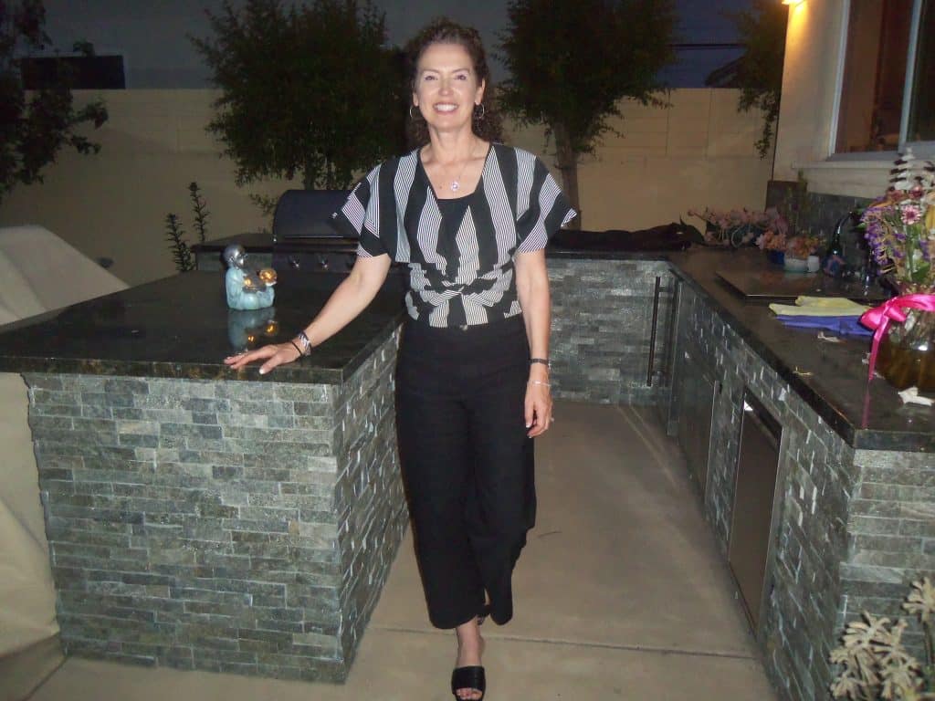 An image of a woman showing off their outfit
