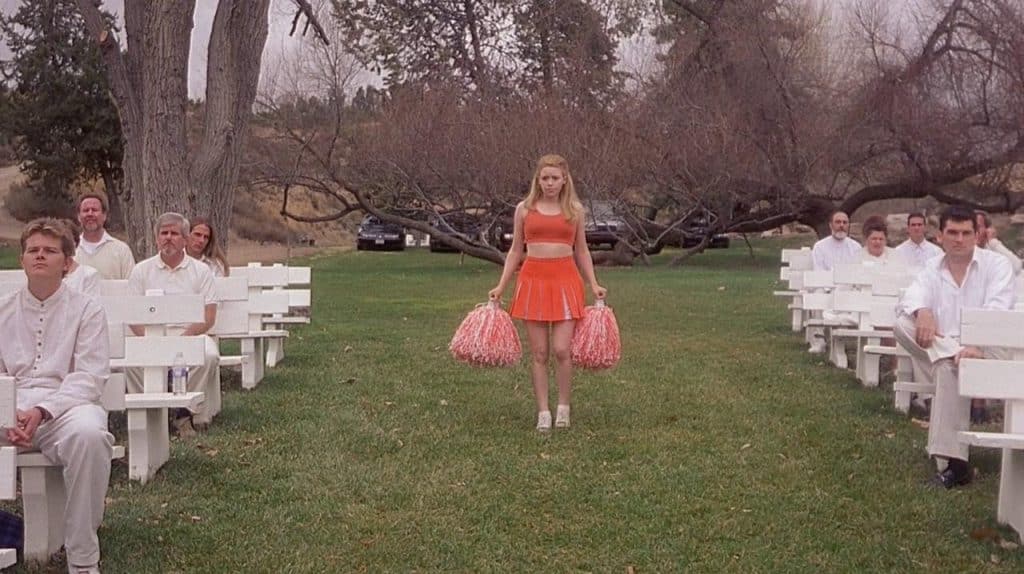 The main character, Megan, dressed in her cheerleading outfit.