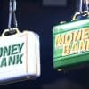 Both Money in the Bank briefcases hanging high above the ring