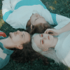 Members of the band Flip turn posing for a still in their music video