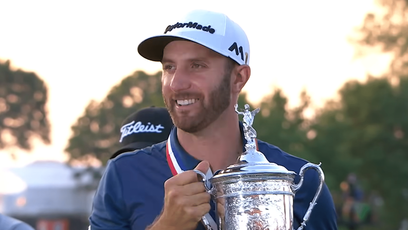 Dustin Johnson Holding the U.S. Open Trophy at Oakmont