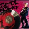 A collage including the logo for My Chemical Romance, a vinyl record of Three Cheers for Sweet Revenge Reissued, bassist Mikey Way, on a blood-spattered background.