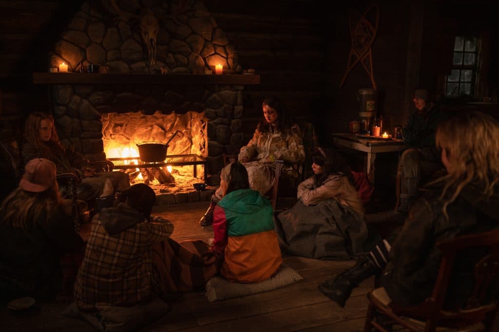 (L-R): Liv Hewson as Teen Van, Courtney Eaton as Teen Lottie, Mya Lowe as Teen Gen and Sophie Nélisse as Teen Shauna in YELLOWJACKETS, "Storytelling". (Photo Credit: Kailey Schwerman/SHOWTIME)