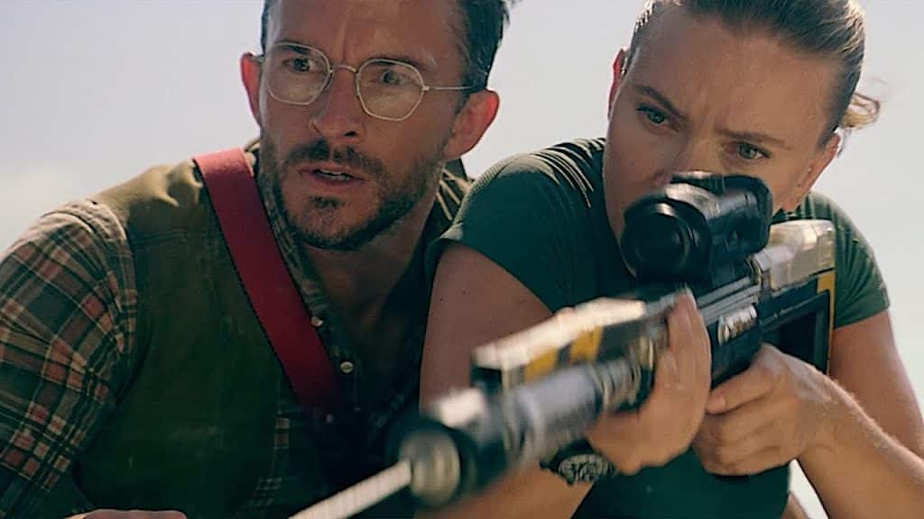 Henry Loomis (Bailey) and Zora Bennett (Johansson) in Jurassic World Rebirth