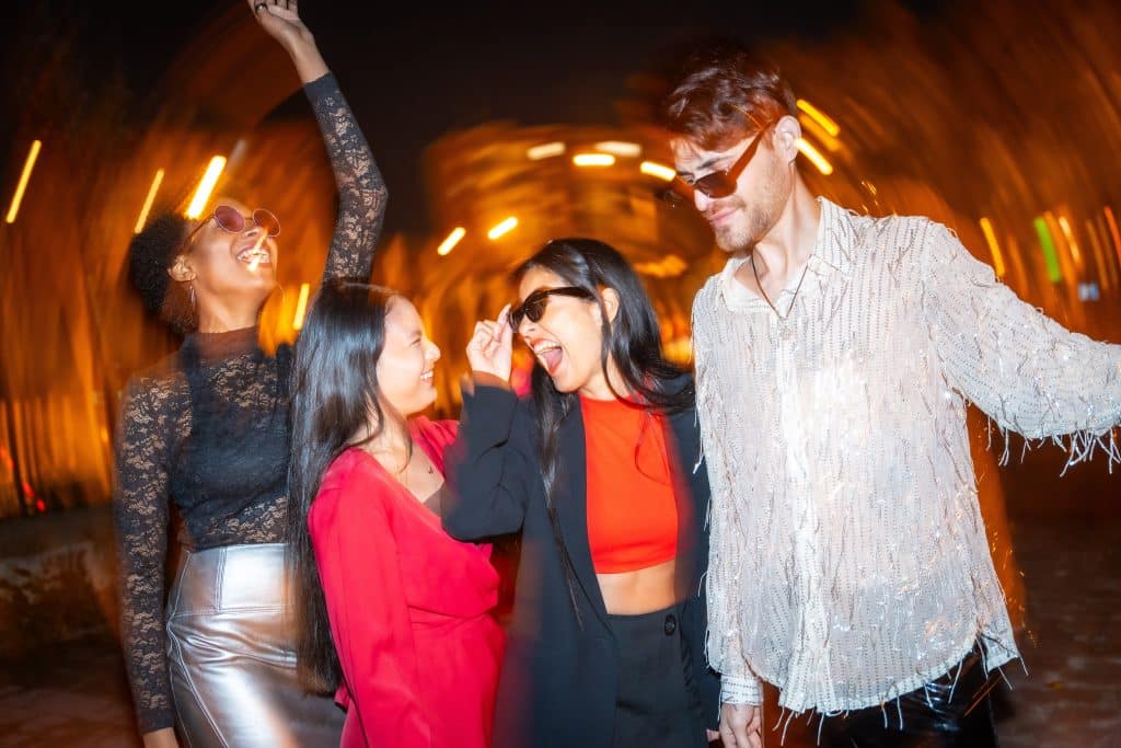 A night out with your best friends heals all wounds. (Image Credit: Unai Huizi Photography/Shuttershock)