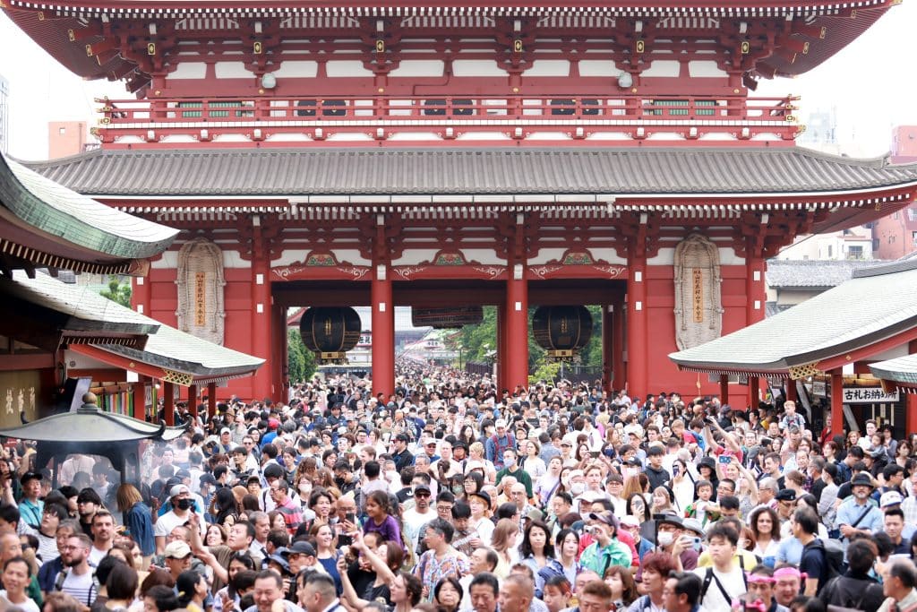 Visitors crowd the street in Tokyo's Sensō-ji temple