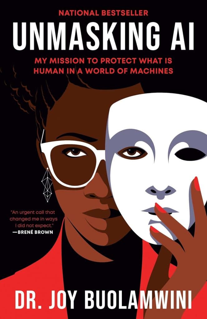 A Black woman holding a mask in front of her face