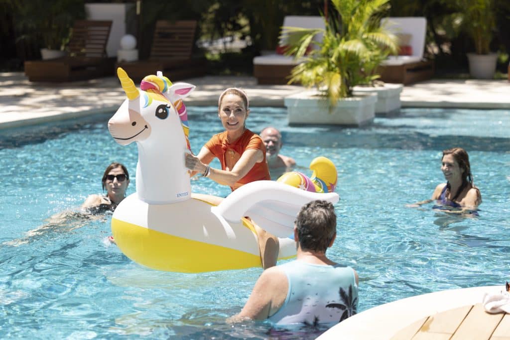 April on a floatie in the pool