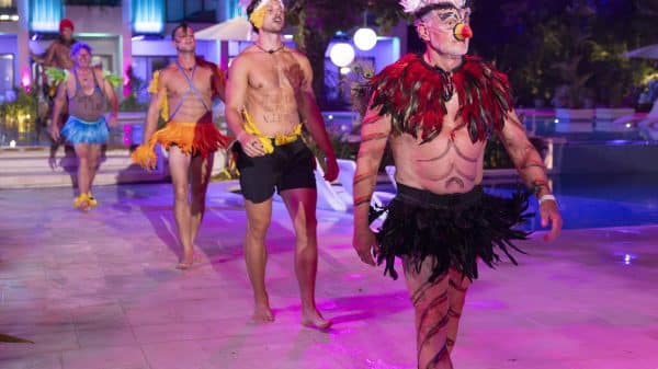 The men of Paradise dressed up as birds.