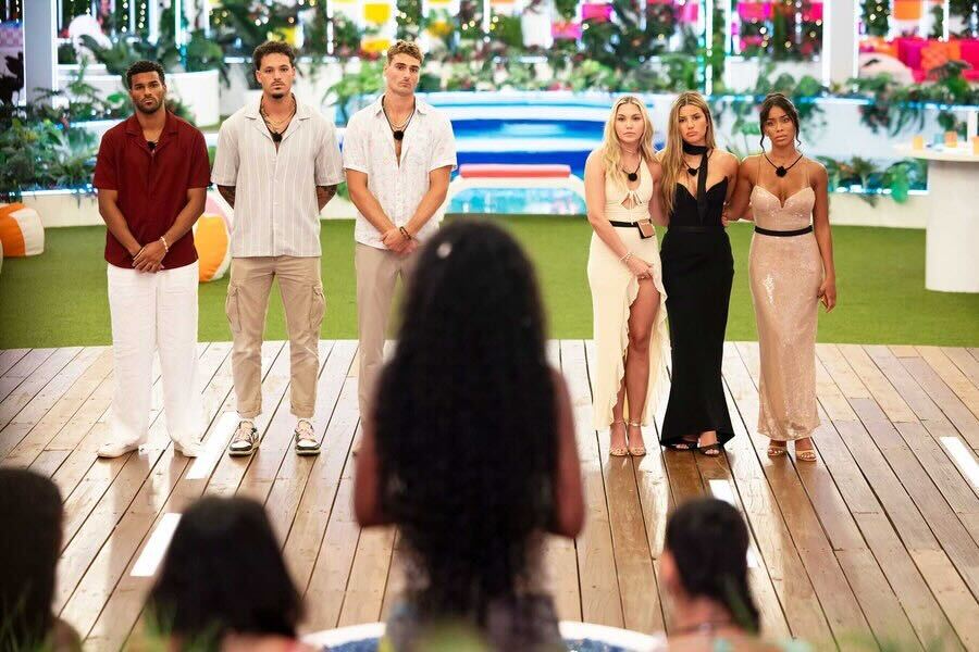 Contestants in Love Island USA recoupling.