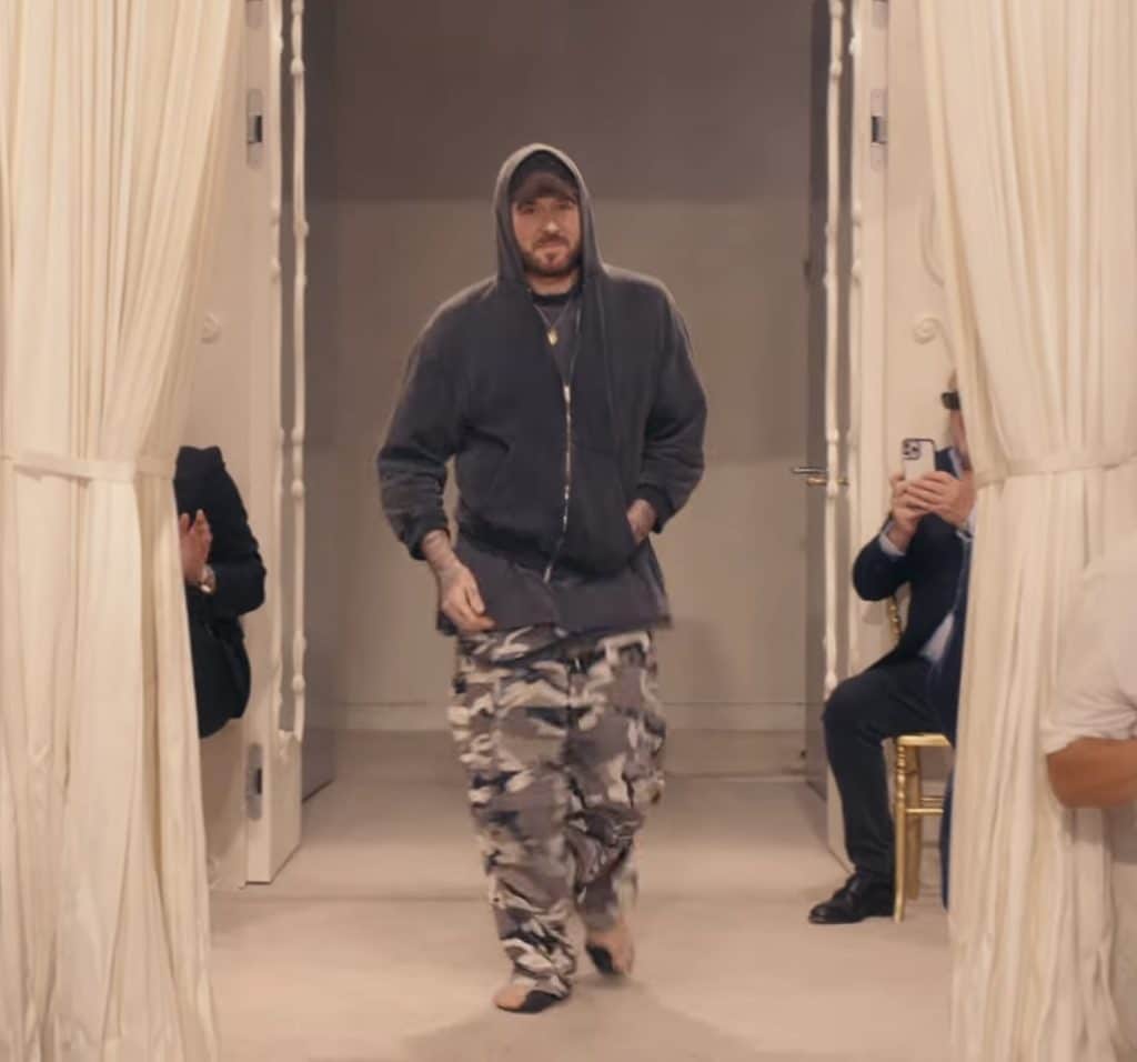 Demna, a fashion designer, walks down his runway as he says goodbye to Balenciaga.