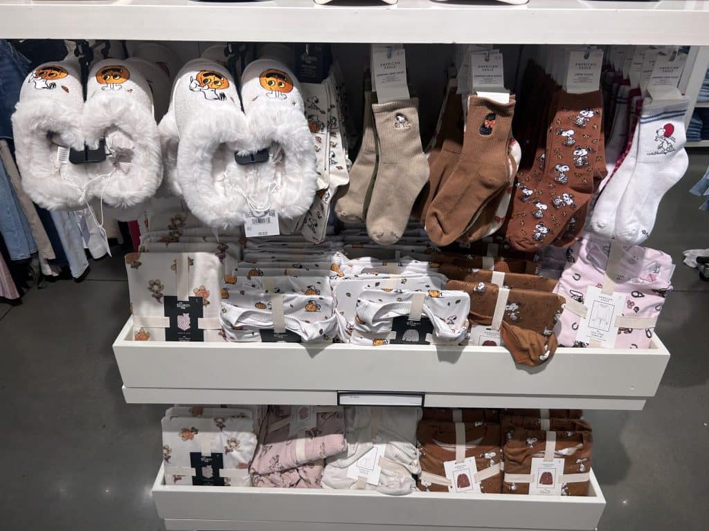 Snoopy, fall-themed socks, PJ sets, and slippers at American Eagle Outfitters.