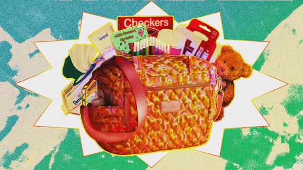 Image shows a blue, green. and ivory splattered background. In front of background is a woven basket with children's items peeking out from behind the basket.