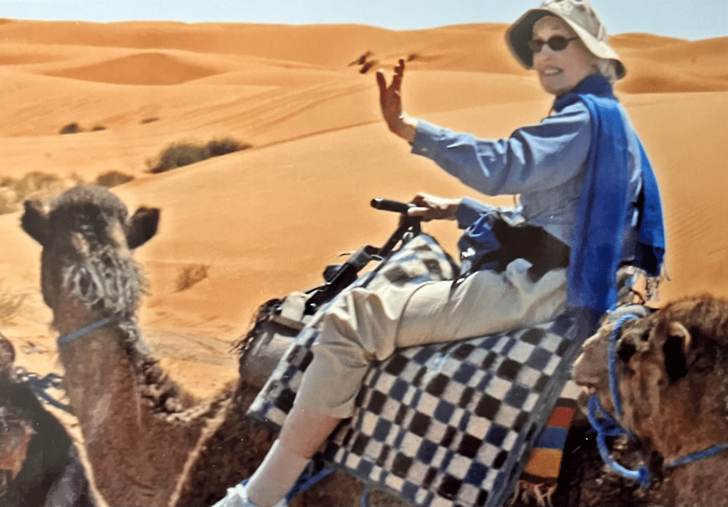 Woman riding on a camel