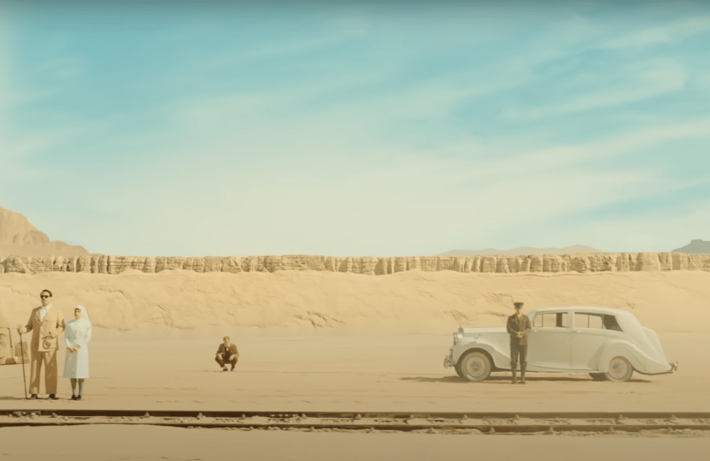 Zorda and his daughter in the middle eastern desert in The Phoenician Scheme