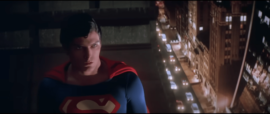 Superman (Christopher Reeve) on top of a building