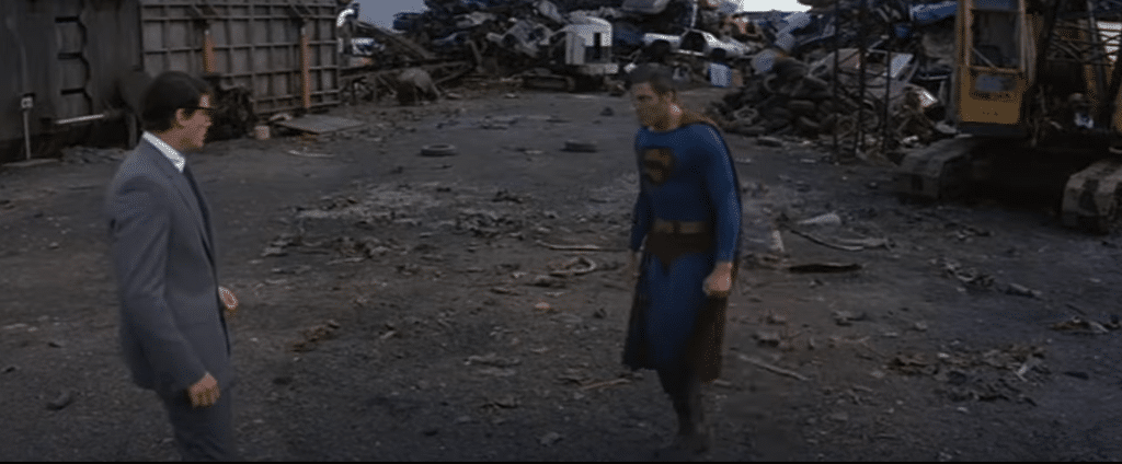 Evil Superman (Christopher Reeve) and Clark Kent (Christopher Reeve) in a junkyard