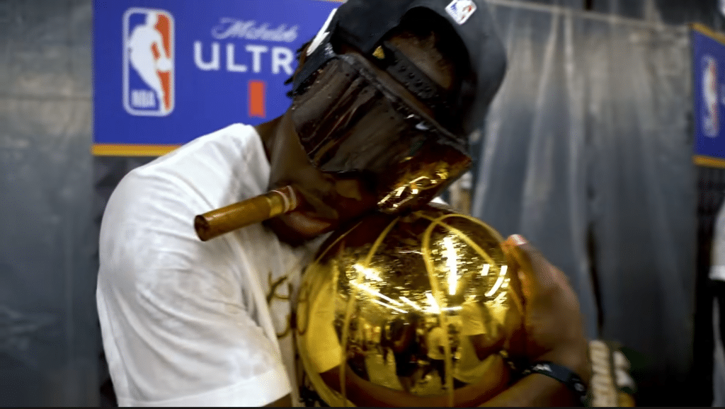 Jrue Holiday celebrates his first NBA Title with the Bucks in 2021. (YouTube/Bleacher Report)