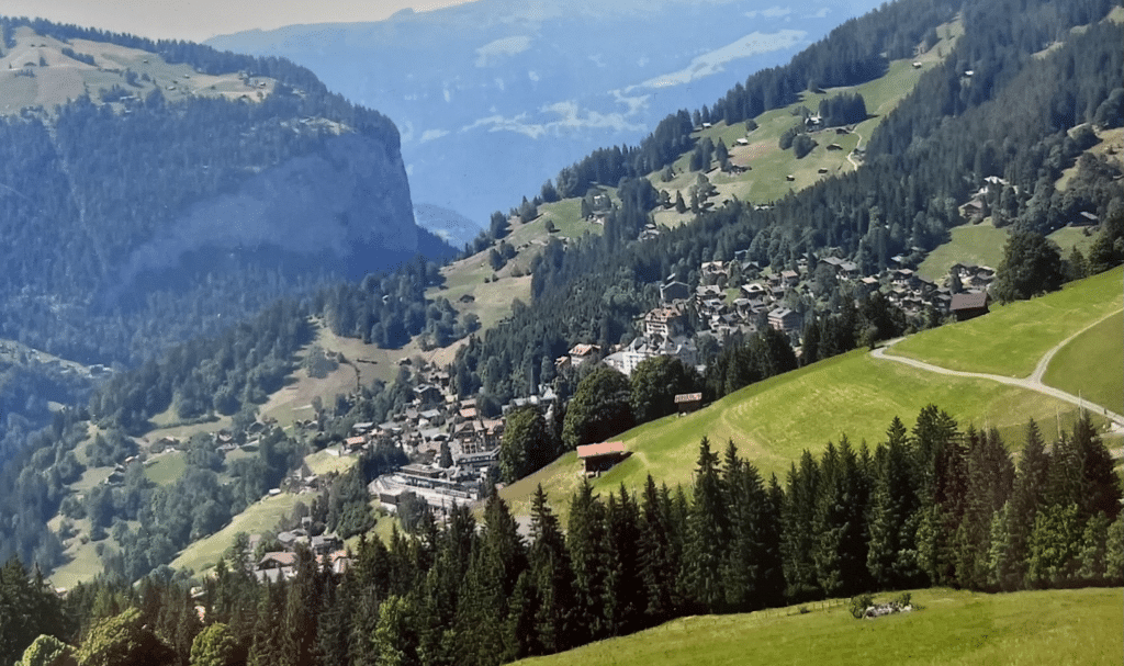 Swiss style houses along the side of a mountain