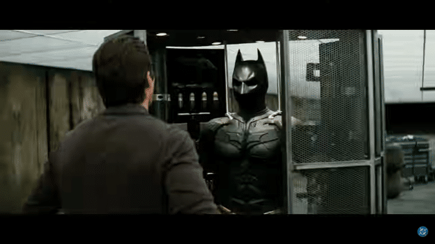 Bruce Wayne (Ben Affleck) staring at the batsuit.