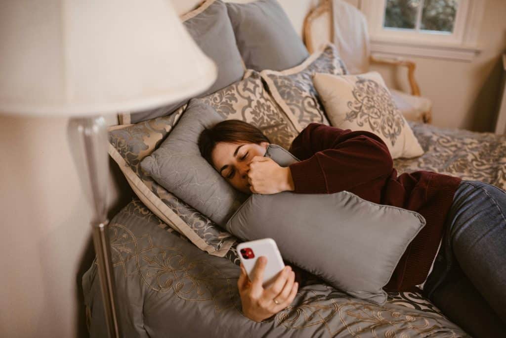 A woman grieving alone after a breakup and friendship loss.