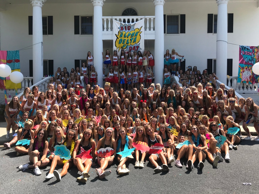 Alpha Delta Pi sorority girls gathered around at Bid Day.