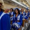 Dallas Cowboys Cheerleaders walking onto the football pitch