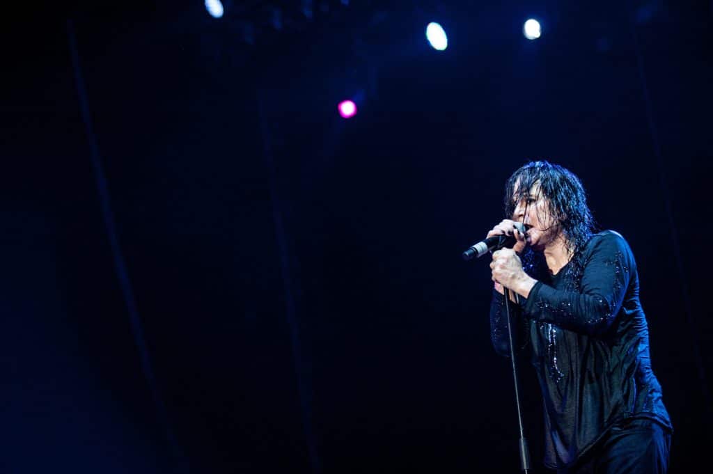 A picture of Ozzy Osbourne singing
