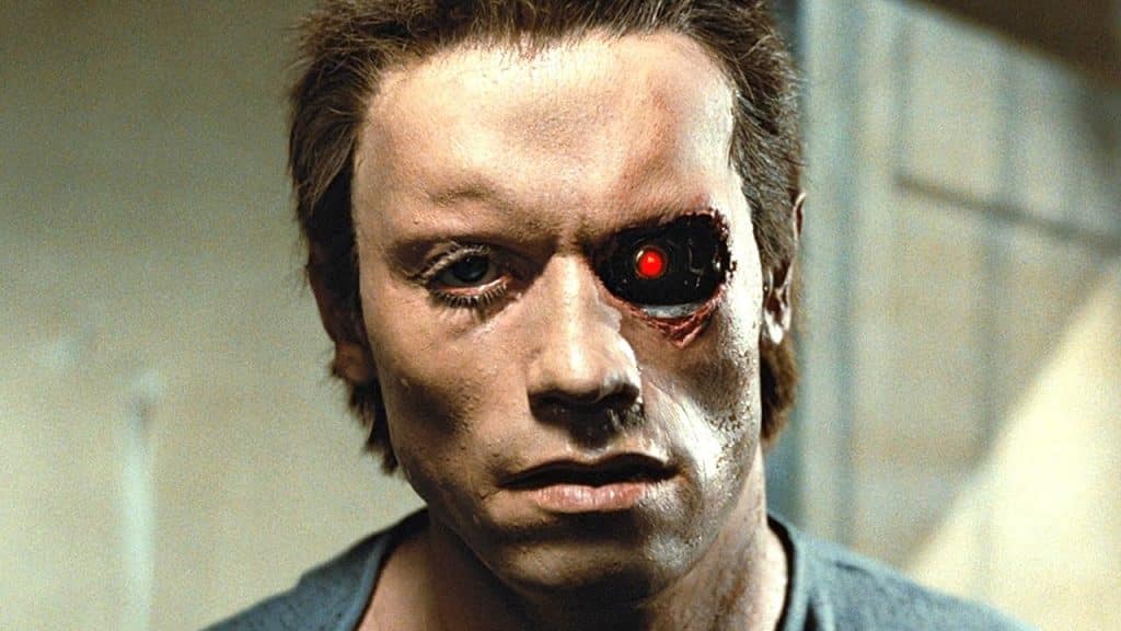 A screencap from Terminator, depicting Schwarzenegger as the robotic villain