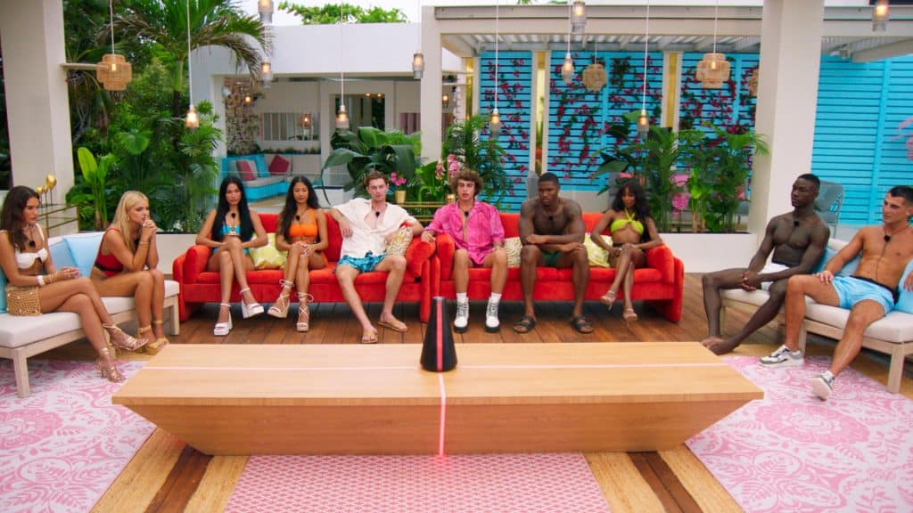 'Too Hot to Handle' season 6 contestants gather around virtual assistant Lana.