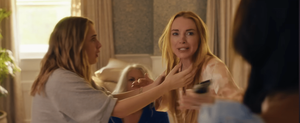 A daughter stares at her mother in shock, as her mother looks at her daughter's friend and the grandma watches from behind.