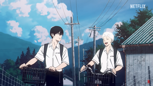 Friends Yoshiki and Hikaru walking with their bikes