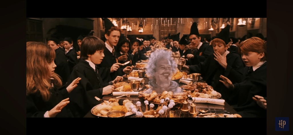 Nearly Headless Nick unexpectedly appears in the first Harry Potter film in the Great Hall.