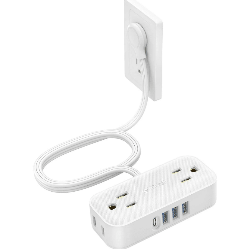 White power strip plugged into a wall outlet for a dorm room.