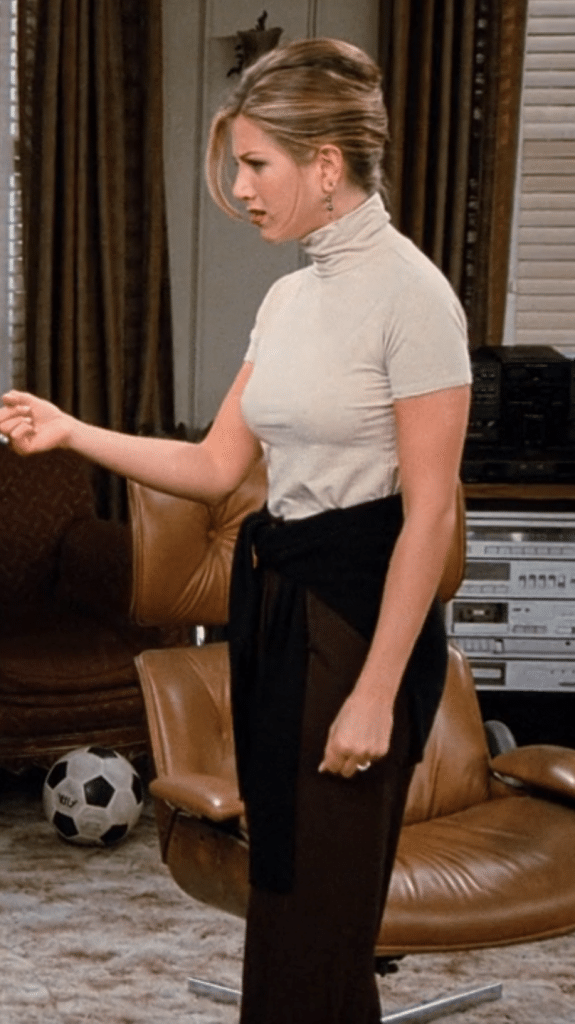 Rachel Green in a beige turtleneck (Credit: Warner Bros. Television via HBO Max/Hulu)